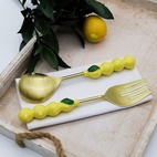 Salladsbestick i citrondesign