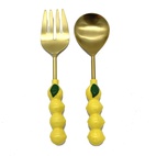 Salladsbestick i citrondesign
